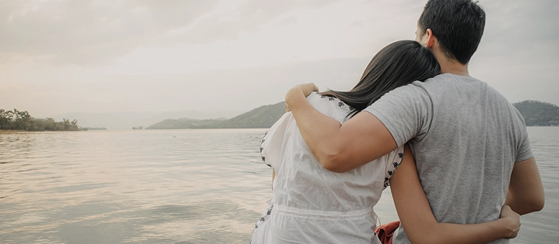 a couple discussing how debt will affect their marriage